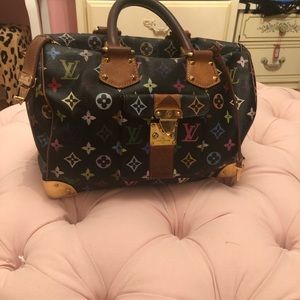 Classic iconic Louis Vuitton black speedy